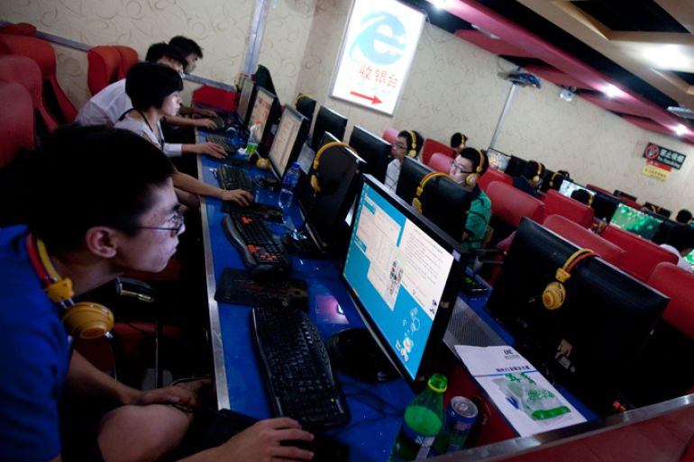 epa02597189 A photo dated 30 July 2010 made available on 23 February 2011 of Chinese people using computers in an internet cafe in Beijing, China. China's state news agency Xinhua launched the Internet search site Panguso.com in partnership with government-owned China Mobile Ltd on 22 February 2011. This comes amid calls for tighter Internet controls and censorship by the government after a failed attempt to use social-networking sites to start a 'Jasmine Revolution' in China on 20 February 2011.