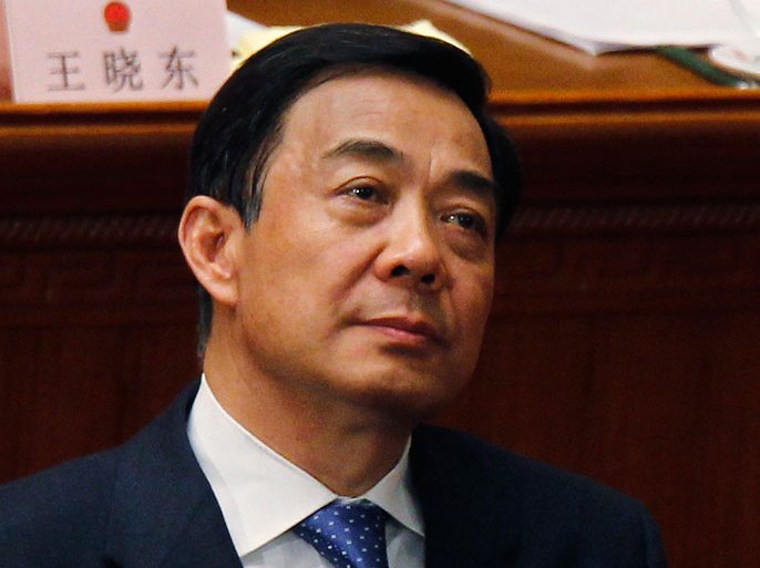epa03137766 China's Chongqing Municipality Communist Party Secretary Bo Xilai is seen during a plenary session at the National People's Congress (NPC) at the Great Hall of the People in Beijing, China, 09 March 2012. China's annual National People's Congress session is clouded by a political scandal over Bo's aide fleeing to a US consulate for asylum, leading to speculation over Bo's future in the next central leadership at the 18th Party Congress later this year.