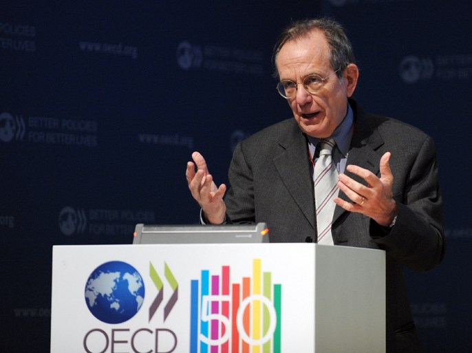 OECD Deputy Secretary-General and Chief Economist Pier Carlo Padoan talks while presenting an interim assessment "what is the economic outlook for OECD countries ?" at the OECD headquarters in Paris on March 29, 2012.