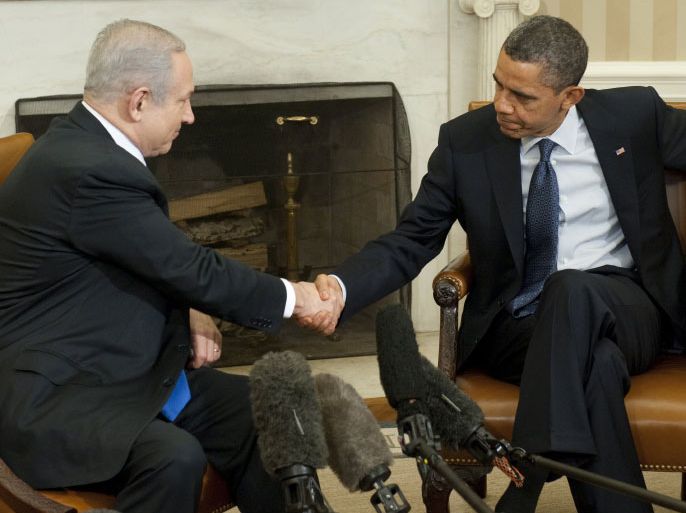 US President Barack Obama shakes hands with Israeli Prime Minister Benjamin Netanyahu (L) during meetings in the Oval Office of the White House in Washington, DC, March 5, 2012. The two leaders go into talks on the Iranian nuclear stand-off, with each publicly seeking to stake out some common ground. AFP PHOTO / Saul LOEB