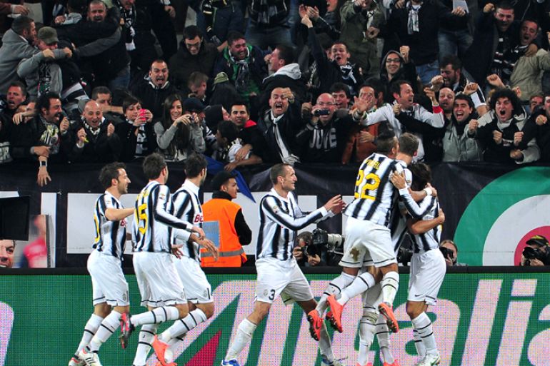 Juventus' Uruguayan defender Martin Caceres celebrates after scoring during the Italian Serie A football match between Juventus and Inter Milan at the Juventus Stadium in Turin on March 25, 2012.