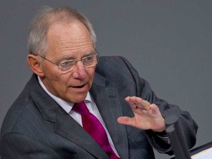 German Finance Minister Wolfgang Schaeuble speaks during a debate of the Bundestag, the lower house of parliament, about the European Fiscal Compact in Berlin March 29, 2012. REUTERS/Thomas Peter (GERMANY - Tags: POLITICS BUSINESS)