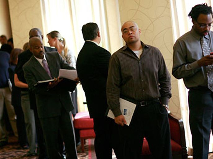 Anthony Bravo (2R) and Antonio Pitchford (R) wait in line to attend the Choice Career Fair held at the Doubletree Hotel on August 19, 2010 in Dallas, Texas. First-time jobless claims rose for the third week in a row, reaching the highest level in nine months.