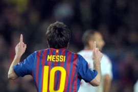 epa03136311 Barcelona's striker Lionel Messi celebrates after scoring the 4-0 lead during the Champions League round of sixteen second leg soccer match between FC Barcelona and Bayer Leverkusen at the Nou Camp stadium in Barcelona, north-eastern Spain, 07 March 2012.