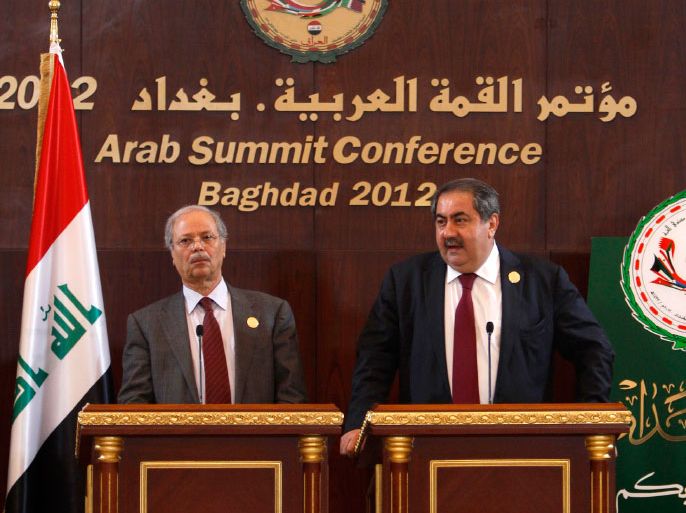 Iraq's Foreign Minister Hoshiyar Zebari (R) speaks during a joint Arab Summit conference with the Arab League's Deputy Secretary General for Political Affairs, Ahmad bin Hilly, in Baghdad March 28, 2012.  REUTERS/Saad Shalash (IRAQ - Tags: POLITICS)