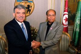 Tunisian President Moncef Marzouki (R) shakes hands with his Turkish counterpart Abdullah Gul on March 8, 2012 at Carthage Palace in Tunis. Gul is on three-day official visit to Tunisia. AFP PHOTO / FETHI BELAID
