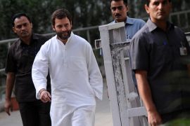 India's ruling Congress party General Secretary Rahul Gandhi (2L) comes out from his residence to address the media in New Delhi on March 6, 2012. Rahul Gandhi, the Congress party politician seen as India's prime-minister-in-waiting, accepted responsibility for poor results in state elections in which he had led campaigning.