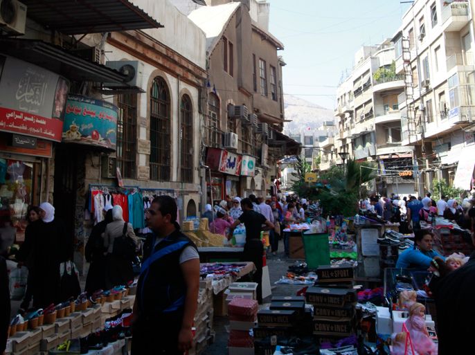 epa02887334 A general view shows al-Salihya, one of the old markets in Damascus, Syria on 29 August 2011. Eid Al-Fitr is one of the most important feasts on the Muslim calendar that marks the end of the Muslims holy month of Ramadan.