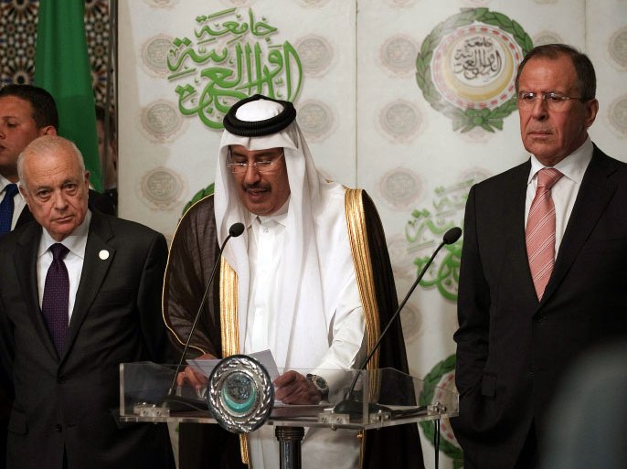 Qatari Prime Minister and Head of the Arab League committee on Syria, Sheikh Hamad bin Jassem al-Thani (C) speaks during a press conference with Russian Foreign Minister Sergei Lavrov (R) and Arab League Secretary General Nabil al-Arabi (L) after meeting on March 10, 2012, to discuss Syria at the Arab League headquarters in Cairo. During the meeting Lavrov made clear to the UN-Arab League envoy for Syria Kofi Annan that Moscow opposed "crude interference" from outside in Syrian internal affairs. AFP PHOTO/GIANLUIGI GUERCIA