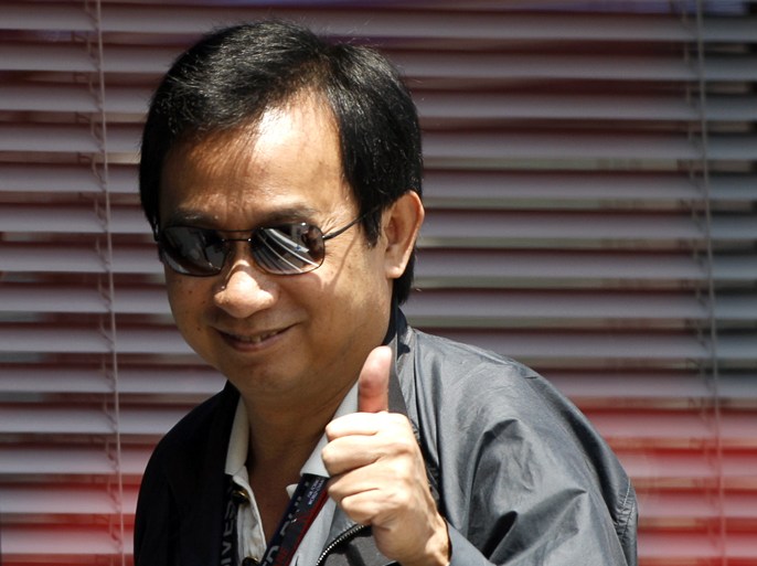epa02179772 Partner of Red Bull Thailandese businessman Chaleo Yoovidhya greets while his arrival to Red Bull motorhome at Istanbul Park circuit in Istanbul, Turkey on 30 May 2010. Turkish Grand Prix will take place on 30 May, Sunday.