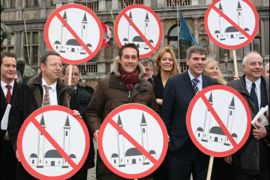 (L-R) Markus Beisicht (Germany), Heinz-Christian Strache (Austria), Filip Dewinter (Belgium), and Robert Spieler (France) of several European right wing parties pose with signs, after the presentation of their organisation of 'Cities against Islamisation' in Antwerp, 17 January 2008.