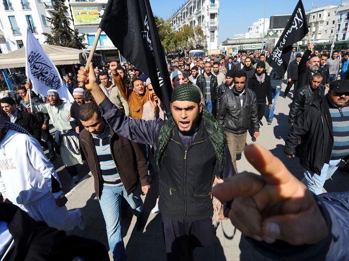Tunisian Salafists shout slogans claiming an Islamic state as they stage a demonstration after the Friday prayer on March 2, 2012 in Tunis. AFP PHOTO / FETHI BELAID
