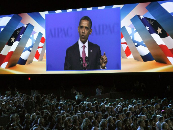 US President Barack Obama is seen on a large monitor as he speaks during the AIPAC Policy Conference at the Washington Convention Center on March 4, 2012 in Washington, DC. Obama reaffirmed his strong backing for key ally Israel on Sunday, warning Iran that he would not hesitate to use force, if required, to stop it developing a nuclear weapon. AFP Photo/Chris KLEPONIS