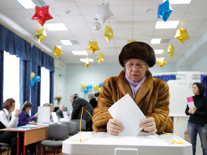‪(رويترز)‬ المعارضة الروسية اعتبرت نتائج الانتخابات إهانة لبلدهم