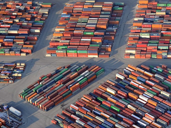 A photo made available 07 February 2012 shows an aerial view of transport containers piled at the container terminal 'Buchardkai' in Hamburg harbor,Germany, on 05 February 2012. The Hamburg port company HHLA has