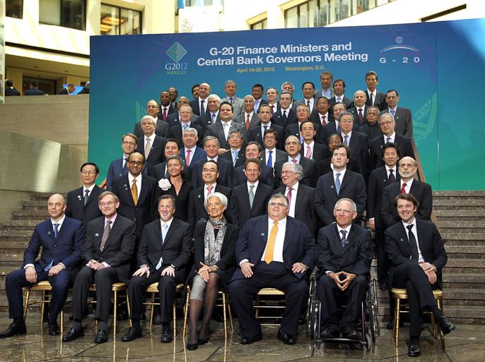 WASHINGTON, DC - APRIL 20: Members of the G-20 Finance Ministers and Central Bank Governors pose for a group photo during the G-20 Finance Ministers and Central Bank Governors Meeting at the International Monetary Fund headquarters April 20, 2012 in Washington, DC. The International Monetary Fund and World Bank are holding their 2012 spring meeting through April 21. Alex Wong/Getty Images/AFP== FOR NEWSPAPERS, INTERNET, TELCOS & TELEVISION USE ONLY ==