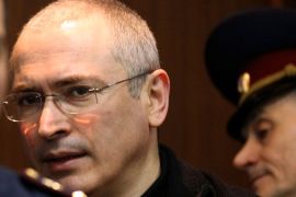 Moscow, -, RUSSIAN FEDERATION : (FILES) A file picture taken on May 17, 2011, shows Russian ex-oil tycoon Mikhail Khodorkovsky arriving at the courtroom in Moscow. A Russian court adjourned until May 24 the appeal of Khodorkovsky against his conviction in a fraud trial that sparked global condemnation, an AFP correspondent reported. Khodorkovsky faced another four years in prison after a top Kremlin rights adviser said today he had been refused a pardon by Russia's President Dmitry Medvedev. The outgoing president unexpectedly ordered a review of the conviction of Khodorkovsky and 31 others upon Prime Minister Vladimir Putin's election to a third term as Kremlin chief. AFP PHOTO / ALEXEY SAZONOV