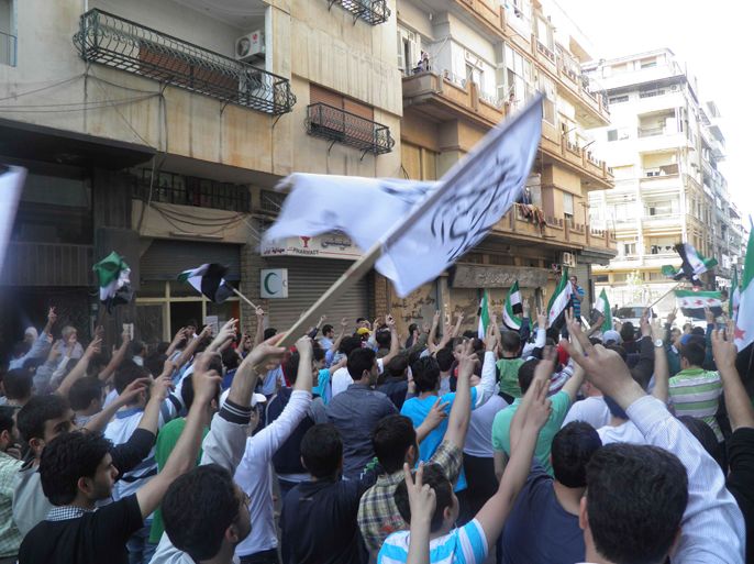 Demonstrators protest against Syria's President Bashar al-Assad after Friday prayers in Homs April 27, 2012. Picture taken April 27.