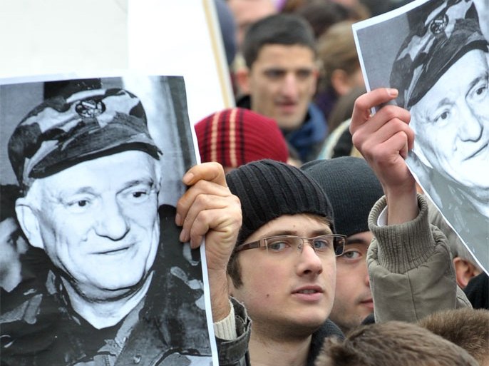 Caption:Citizens of Sarajevo protest in front of the building of the EU Special Representative office building in Sarajevo, to show support for retired General Jovan Divjak in Sarajevo on March 5, 2011. Some 5.000 citizens gathered in Sarajevo showing their dissagreement with the arrest of Bosnian wartime general Jovan Divjak who was arrested by Austrian authorities at international airport in Vienna on March 3, based on Interpol's warrant whereby he is wanted by Serbian judicial authority for warcrimes against soldiers of Yugoslav People's Army in April 1992, at the begining of the siege of Sarajevo.