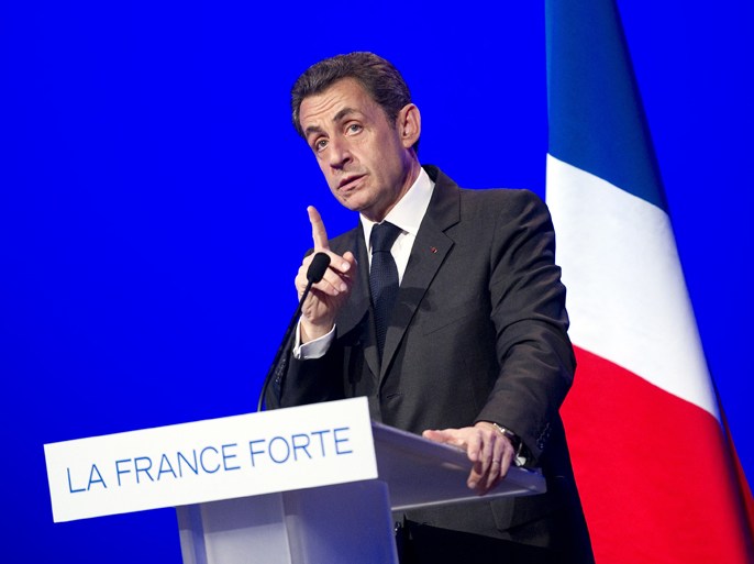 France's incumbent President and UMP ruling party's candidate for the 2012 presidential election, Nicolas Sarkozy gestures as he gives a speech during a campaign meeting on April 16, 2012 in the central French city of Chasseneuil-du-Poitou near Poitiers. AFP
