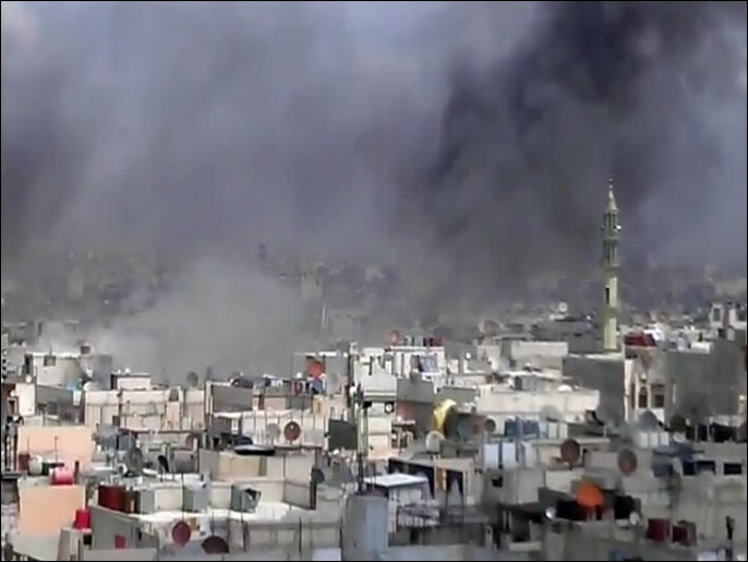 بث ناشطون صورا على الانترنت لقصف القوات النظامية بالهاون والصواريخ على حيّي الخالدية والحميدية في حمص