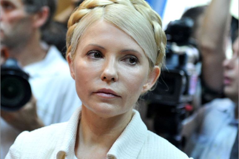 (FILES) In this photograph taken on June 24, 2011 Ukraine's ex-prime minister Yulia Tymoshenko looks on at the beginning her court hearing in Kiev. Ukraine's jailed opposition leader Yulia Tymoshenko began receiving back pain treatment in hospital on April 21, 2012 after missing the controversial opening of her new trial for tax fraud. AFP PHOTO/ SERGEI SUPINSKY