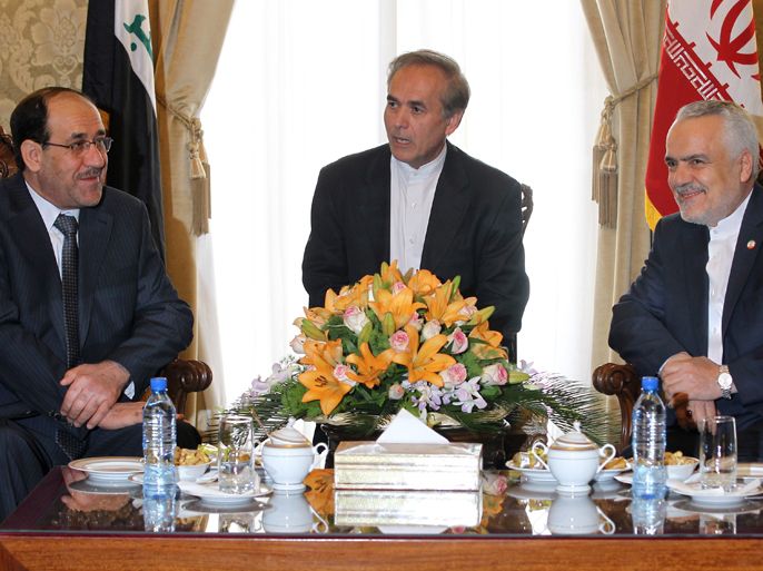Iran's First Vice President Mohammad Reza Rahimi (R) meets with Iraqi Prime Minister Nouri al-Maliki (L) in Tehran on April 22, 2012 upon the latter's arrival for two days of meetings with Iranian leaders and senior officials on various bilateral issues. The visit notably comes ahead of an important May 23 meeting to be hosted in Baghdad between Iran and the P5+1 group of world powers on Tehran's disputed nuclear programme. AFP