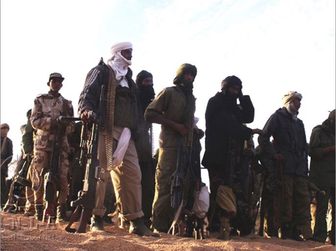 A handout picture released by the Mouvement national pour la libération de l'Azawad (Azawad National Liberation Movement - MLNA) on April 2, 2012 and taken in February 2012 reportedly shows MNLA fighters gathering in an undisclosed location in Mali. The MNLA on April 4, 2012 have declared an end to military operations in the North of Mali. The MNLA said in a statement that "after the complete liberation of the Azawad territory (northern Mali) and given the strong request by the international community" it had decided "unilaterally to declare the end of military operations from midnight Thursday."