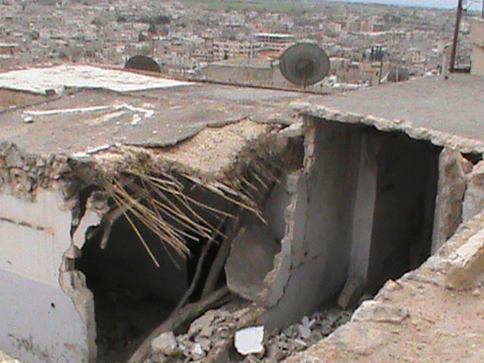 جانب من الدمار الذي أصاب الرستن شمال حمص بسبب استمرار قصف القوات النظامية (الفرنسية)