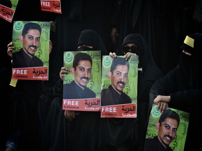 : (FILES) - A picture taken on Appril 24 2012 shows Bahraini Shiite Muslim women rally to show their solidarity with Abdul Hadi al-Khawaja (photos), a prisoner who is began his hunger strike, in the village of Jidhafs, West Manama