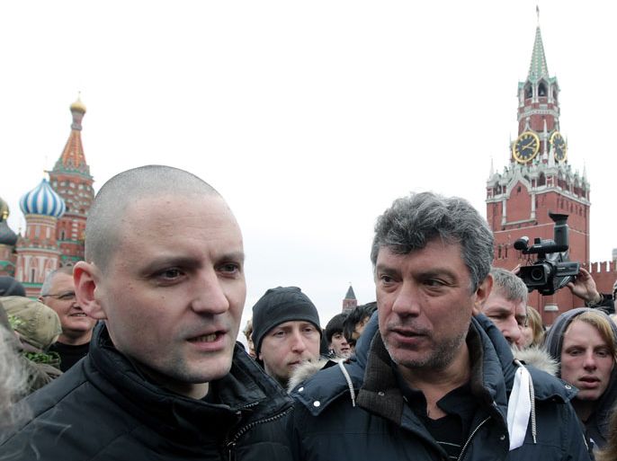 Russian Left Front movement leader Sergey Udaltsov (front L) and Leader of People's Freedom party Boris Nemtsov