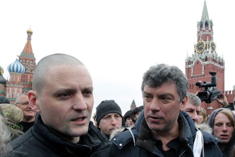 Russian Left Front movement leader Sergey Udaltsov (front L) and Leader of People's Freedom party Boris Nemtsov