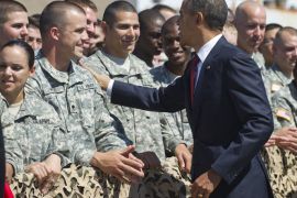 US President Barack Obama greets US troops upon arrival on Air Force One at Hunter Army Airfield in Hinesville, Georgia, April 27, 2012, enroute to visit with US troops at Fort Stewart in Georgia. AFP PHOTO / Saul LOEB