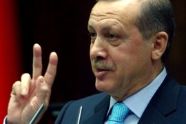 Turkey's Prime Minister Recep Tayyip Erdogan gestures during an address to members of parliament from the ruling AK Party (AKP) at the Turkish parliament in Ankara on April 3, 2012. AFP