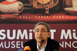 Orhan Pamuk, Turkish novelist and winner of the 2006 Nobel Prize in Literature, poses during a press conference before the opening of the Museum of Innocence in Istanbul on April 27, 2012