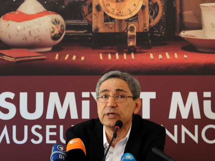 Orhan Pamuk, Turkish novelist and winner of the 2006 Nobel Prize in Literature, poses during a press conference before the opening of the Museum of Innocence in Istanbul on April 27, 2012