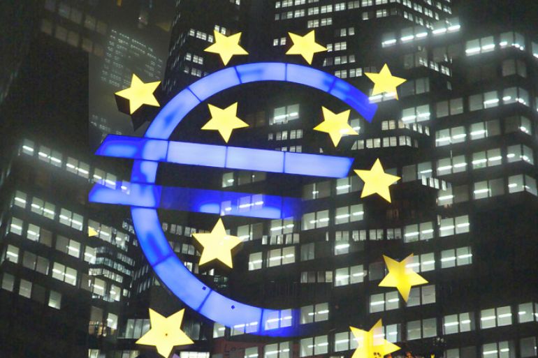 (FILE) A file photograph showing a general view showing the Euro sign in front of the European Central Bank (R) in Frankfurt am Main, Germany, late 28 November 2011. Media reports on 02 April 2012 state that unemployment across