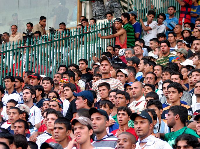 epa01466070 Spectators watch the final of the Iraqi Championship between Al-Zawraa Sports Club and Erbil Sports Club at al-Shaab stadium in Baghdad, Iraq on 24 August 2008. The Kurdish team of Erbil defeated the home team Al-Zawraa Sports Club from Baghdad 1-0 in the match attended by tens of thousands.