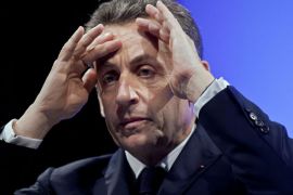 Paris, Paris, FRANCE : France's President and UMP ruling party candidate for the 2012 French presidential elections Nicolas Sarkozy gestures as he gives a speech during a campaign meeting in Paris, on April 17, 2012. POOL AFP PHOTO Thibault Camus