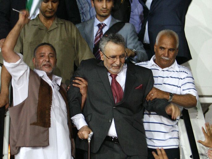 A handout file picture obtained from Oya newspaper shows Libyans greeting freed Lockerbie bomber Abdelbaset Ali Mohmet al-Megrahi (C), the sole Libyan convicted over the 1988 Pan Am jetliner bombing, upon his arrival in Tripoli late on August 20, 2009. Megrahi, the only person convicted over the