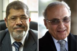 A combo of two file pictures shows Muslim Brotherhood presidential candidate, Mohammed Mursi (L), at his office in Cairo on November 28, 2011, and former prime minister and presidential candidate, Ahmed Shafiq (R), in Cairo on March 10, 2012. Egypt looked set on May 25, 2012 for a run-off presidential vote pitting Mursi against Shafiq, according to tallies by the Islamist group. AFP PHOTO/ODD ANDERSON/KHALED DESOUKI