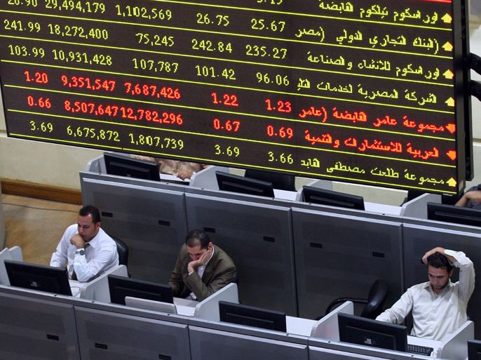 epa02985880 Brokers work at the Egyptian stock exchange in Cairo, Egypt, 30 October 2011. Egypt's benchmark EGX30 index inched up by 2.6 per cent. According to media sources on 28 October, financial analysts said Middle East stock markets stand to gain in the short term from the European debt deal that massively cuts Greece's debt. They expected Arab bourses to rally this week after several weeks of losses due to what they called hesitation on the part of European policymakers to adopt effective solutions. EPA/KHALED ELFIQI