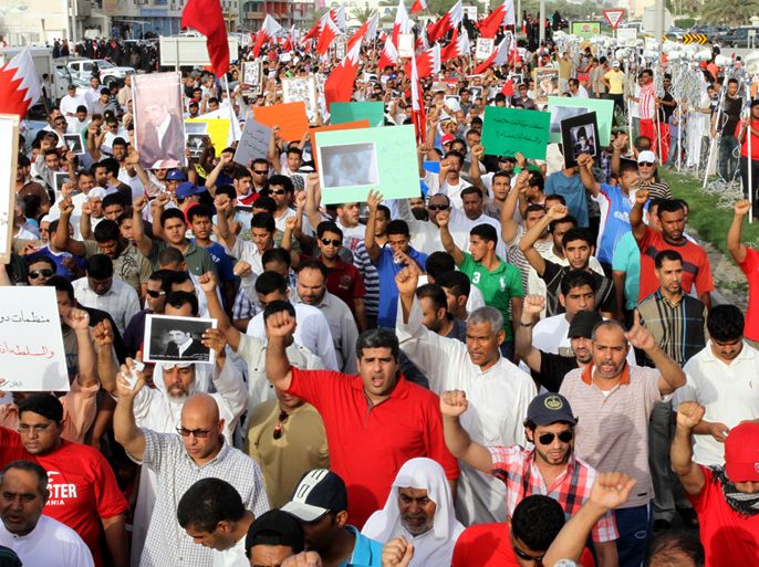 A handout picture released by Bahrain's main opposition Al-Wefaq group shows Bahraini protesters marching during a demonstration following Friday noon prayers west of Manama, on May 4, 2012. Thousands of Bahrainis took to the streets in a demonstration called by the opposition to protest against constitutional reforms that they say are not enough.