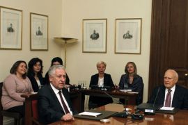 GREECE : Greek President Carolos Papoulias (R) meets with leader of the Left Democratic party (DIMAR) Fotis Kouvelis at the Presidential Palace in Athens, on May 13 , 2012. Papoulias has called the leaders of Greece's political parties to meetings today, in a last-ditch effort to broker a deal for a coalition government. AFP
