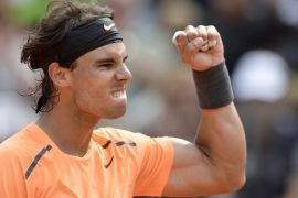 Spanish Rafael Nadal celebrates defeating Czech Republic's Tomas Berdych 6-4, 7-5 during their quarter-finals match of the ATP Rome tournament on May 18, 2012. AFP PHOTO / FILIPPO MONTEFORTE