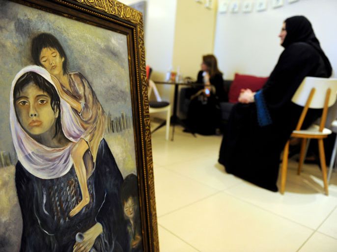 - Riyadh, -, SAUDI ARABIA : Saudi and foreign women attend the opening of a cultural art exhibition in Riyadh on May 2, 2012. AFP PHOTO/FAYEZ NURELDINE