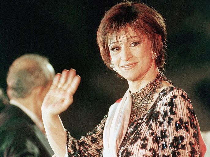 (FILES) -- File picture dated November 1, 1999 shows Algerian singer Warda acknowledging applause at a concert in Algiers. The veteran singer, who moved to Egypt in the 1960s, was born near Paris in 1940 to an Algerian father and a Lebanese mother. She died of a heart attack at her apartment in Cairo late on May 17, 2012, according to her family. Warda was married to one of Egypt's most prominent composers, the late Baligh Hamdi, in the 1970s and her popularity went beyond the borders of Egypt and Algeria to cover the whole Arab world. AFP