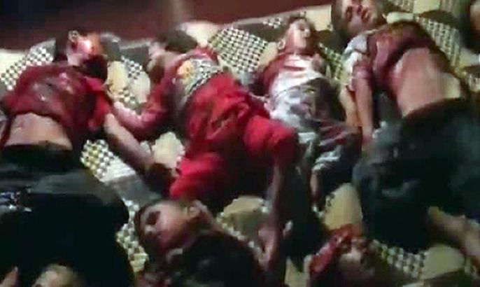 An image grab taken from a video uploaded on YouTube on May 25, 2012, allegedly shows the bodies of Syrian children who were killed in a deadly shelling by regime forces in Houla in the central province of Homs. Syrian regime forces have "massacred" more than 90 people, including 25 children, in the town of Houla, the Syrian Observatory for Human Rights said