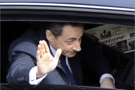 France's outgoing president Nicolas Sarkozy gestures as he leaves a ceremony marking the 67th anniversary of the Allied victory over Nazi Germany in World War II, in Paris, on May 8, 2012 at the Arc de Triomphe in Paris. AFP PHOTO BERTRAND GUAY