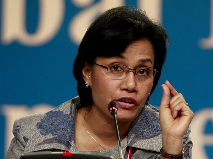 epa03020278 Sri Mulyani Indrawati of World Bank, speaks about 'Catalyzing Development How to Maximize Impact on Development?' during the 4th High Level Forum on Aid Effectiveness on BEXCO in Busan, South Korea, 01 December 2011. The 4th High Level Forum on Aid Effectivness is held under the motto 'Building a New Global Partnership for Effective Development Cooperation' from 29 November to 01 December 2011. EPA/JEON HEON-KYUN